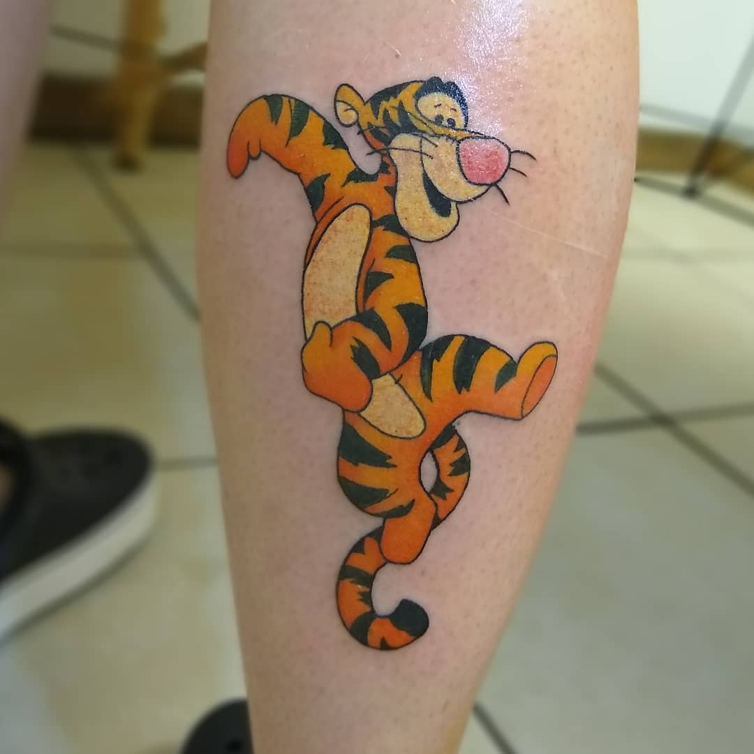 Tattoo of Disney's Tigger character from Winnie the Pooh on a calf